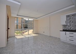 جانب المشفى الحكومي في الانيا - شقة 2 غرفة وصالة ضمن مجمع حديث في اوبا / الانيا 