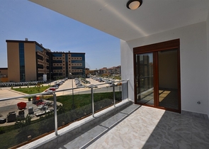 جانب المشفى الحكومي في الانيا - شقة 2 غرفة وصالة ضمن مجمع حديث في اوبا / الانيا 