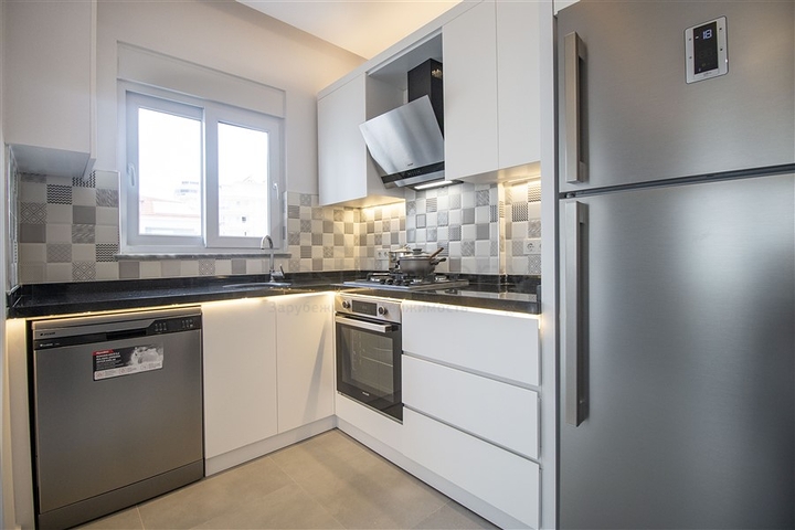 شقة غرفة وصالة مفروشة - ضمن مجمع حديث - في محمودلار / الانيا 