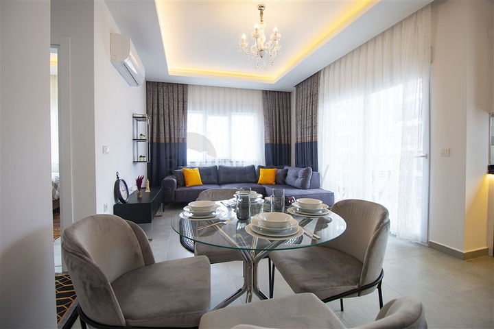 شقة غرفة وصالة مفروشة - ضمن مجمع حديث - في محمودلار / الانيا 