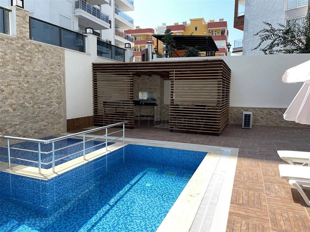 شقة غرفة وصالة مفروشة - ضمن مجمع حديث - في محمودلار / الانيا 