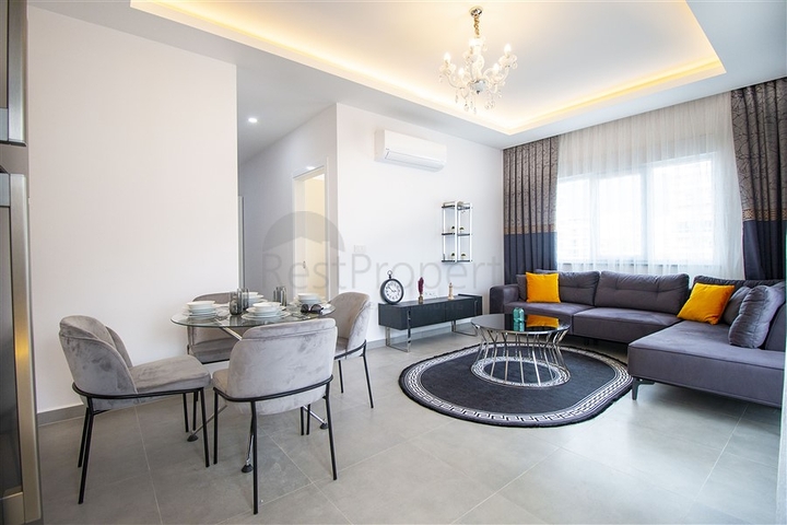 شقة غرفة وصالة مفروشة - ضمن مجمع حديث - في محمودلار / الانيا 
