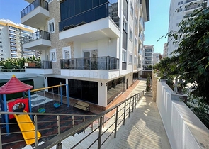 شقة غرفة وصالة مفروشة - ضمن مجمع حديث - في محمودلار / الانيا 