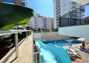 شقة غرفة وصالة مفروشة - ضمن مجمع حديث - في محمودلار / الانيا 