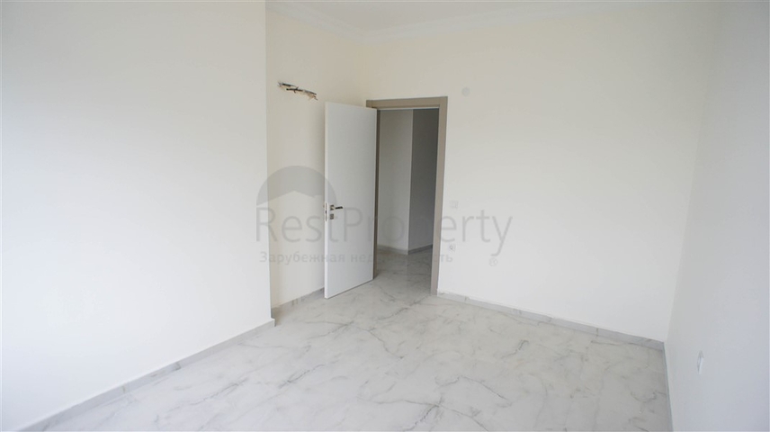 شقة غرفتين وصالة -مجمع حديث - في محمودلار/ الانيا 