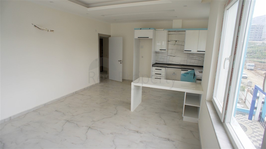 شقة غرفتين وصالة -مجمع حديث - في محمودلار/ الانيا 