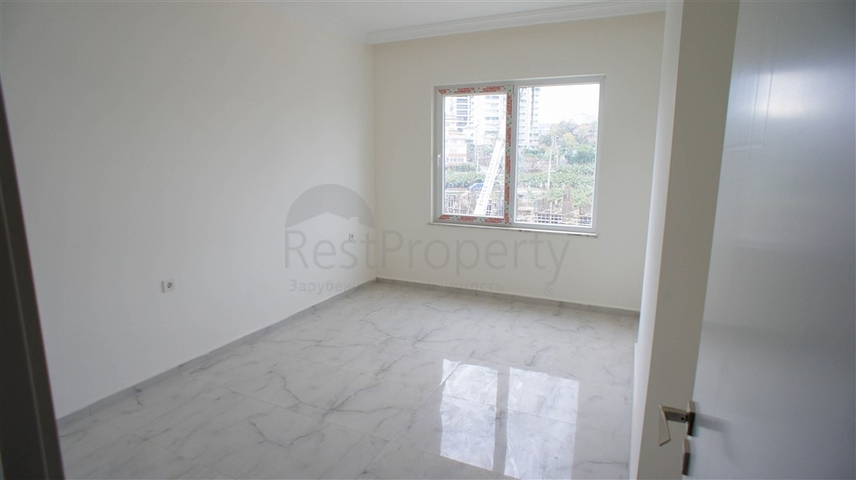 شقة غرفتين وصالة -مجمع حديث - في محمودلار/ الانيا 