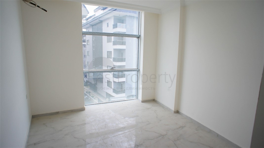 شقة غرفتين وصالة -مجمع حديث - في محمودلار/ الانيا 