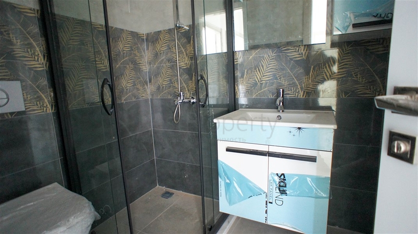 شقة غرفتين وصالة -مجمع حديث - في محمودلار/ الانيا 