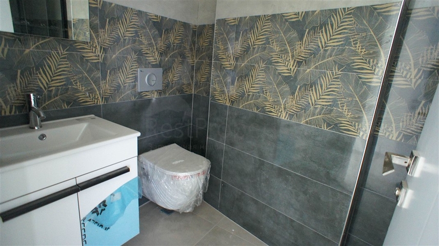 شقة غرفتين وصالة -مجمع حديث - في محمودلار/ الانيا 