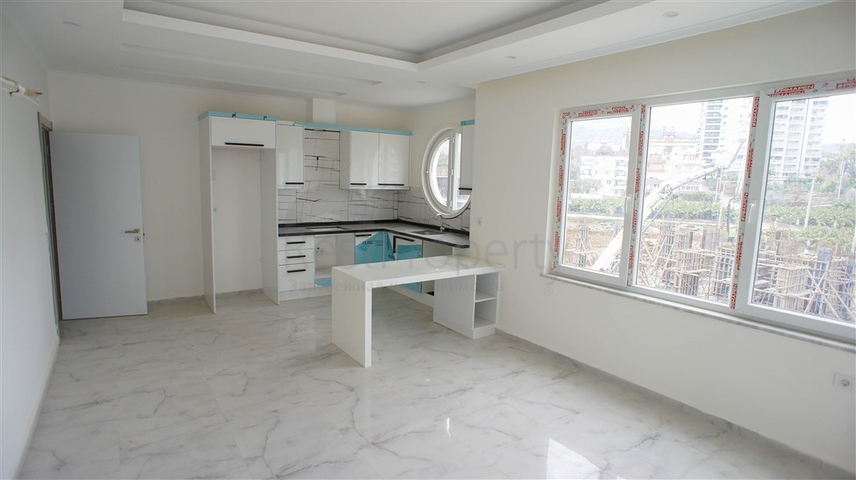 شقة غرفتين وصالة -مجمع حديث - في محمودلار/ الانيا 