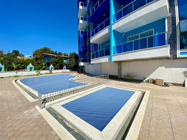 شقة غرفتين وصالة -مجمع حديث - في محمودلار/ الانيا 