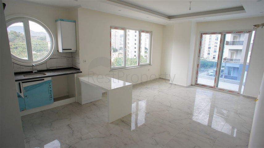 شقة غرفتين وصالة -مجمع حديث - في محمودلار/ الانيا 