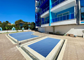 شقة غرفتين وصالة -مجمع حديث - في محمودلار/ الانيا 