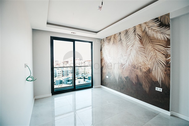 شقة فاخرة على البحر مباشرة - غرفتين وصالة -ضمن مجمع جديد - محمودلار / الانيا 