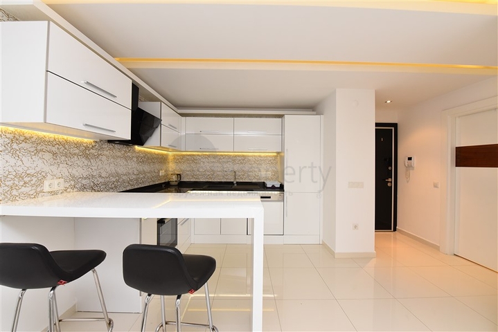 شقة غرفة وصالة ضمن مجمع فاخر في مركز الانيا 