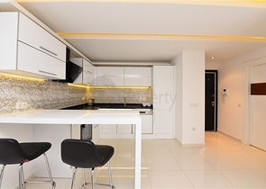 شقة غرفة وصالة ضمن مجمع فاخر في مركز الانيا 