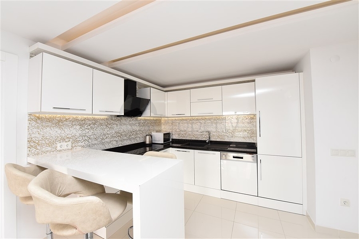 مجمع فاخر في مركز الانيا - شقة غرفتين وصالة مفروشة -قريبة من شاطئ كليوباترا 