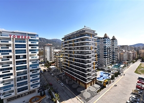 شقة انيقة  - غرفة وصالة مفروشة -ضمن مجمع حديث - في محمودلار / الانيا