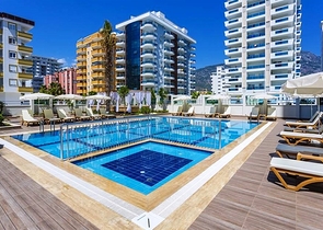 شقة انيقة  - غرفة وصالة مفروشة -ضمن مجمع حديث - في محمودلار / الانيا