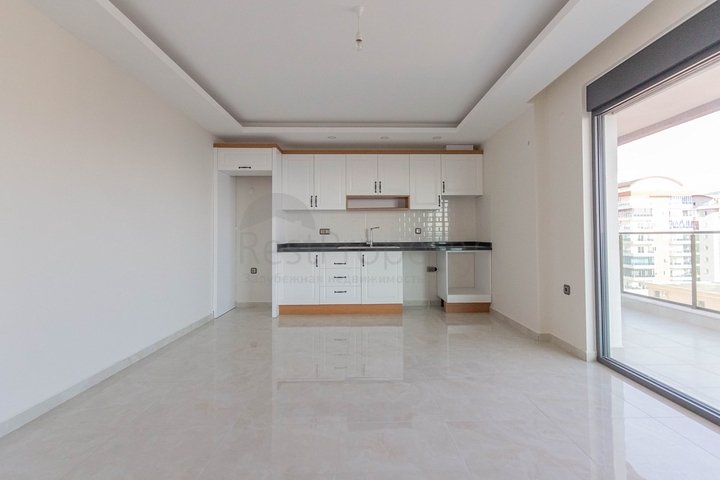 اطلالة بحرية مباشرة -شقة غرفتين وصالة - مجمع حديث -في محمودلار/ الانيا 