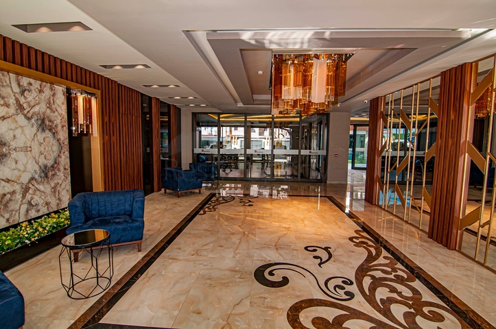 اطلالة بحرية مباشرة -شقة غرفتين وصالة - مجمع حديث -في محمودلار/ الانيا 