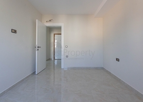 اطلالة بحرية مباشرة -شقة غرفتين وصالة - مجمع حديث -في محمودلار/ الانيا 