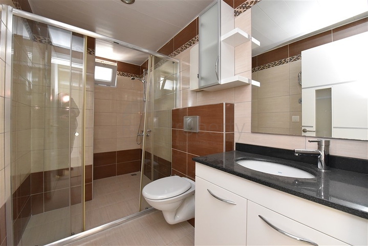 ضمن مجمع يضم كافة الخدمات -شقة غرفتين وصالة -في افسلار / الانيا 