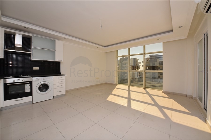 ضمن مجمع يضم كافة الخدمات -شقة غرفتين وصالة -في افسلار / الانيا 