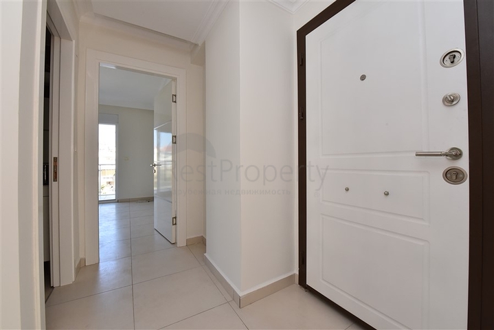 ضمن مجمع يضم كافة الخدمات -شقة غرفتين وصالة -في افسلار / الانيا 