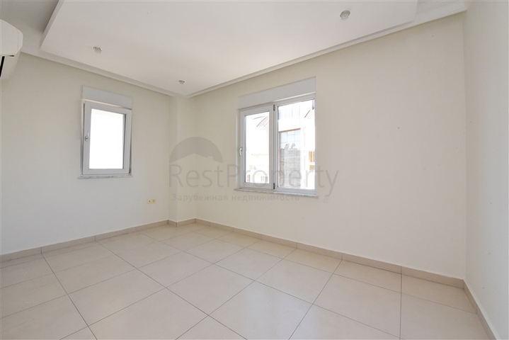 ضمن مجمع يضم كافة الخدمات -شقة غرفتين وصالة -في افسلار / الانيا 