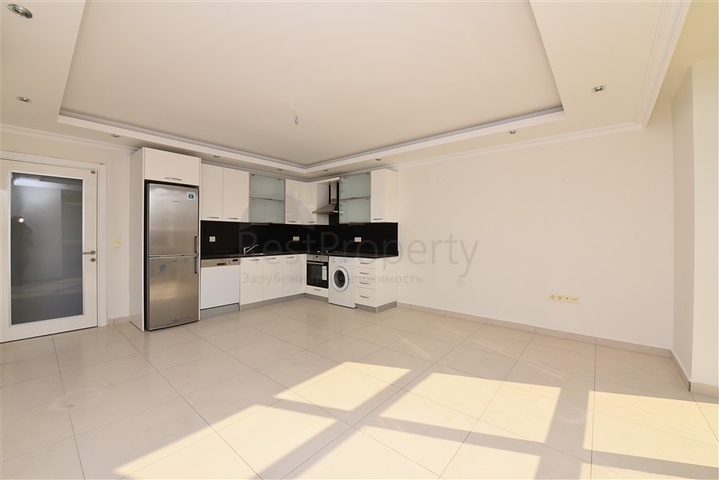 ضمن مجمع يضم كافة الخدمات -شقة غرفتين وصالة -في افسلار / الانيا 