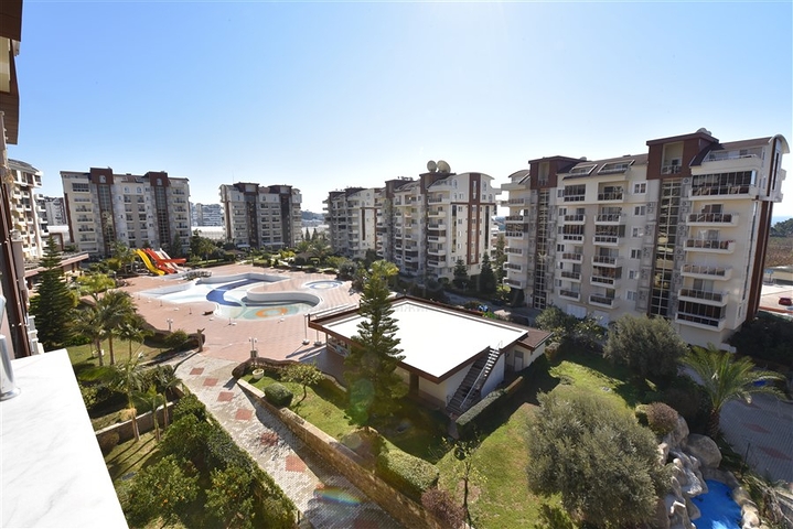 ضمن مجمع يضم كافة الخدمات -شقة غرفتين وصالة -في افسلار / الانيا 