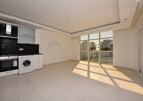 ضمن مجمع يضم كافة الخدمات -شقة غرفتين وصالة -في افسلار / الانيا 