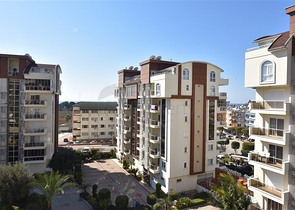 ضمن مجمع يضم كافة الخدمات -شقة غرفتين وصالة -في افسلار / الانيا 