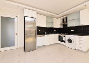 ضمن مجمع يضم كافة الخدمات -شقة غرفتين وصالة -في افسلار / الانيا 