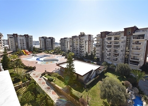 ضمن مجمع يضم كافة الخدمات -شقة غرفتين وصالة -في افسلار / الانيا 