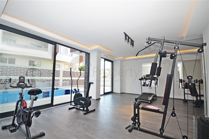 شقة غرفة وصالة ضمن مجمع جديد - في محمودلار / الانيا 