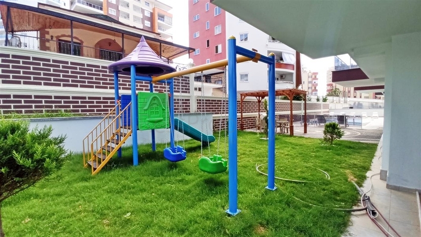 شقة غرفة وصالة ضمن مجمع جديد - في محمودلار / الانيا 