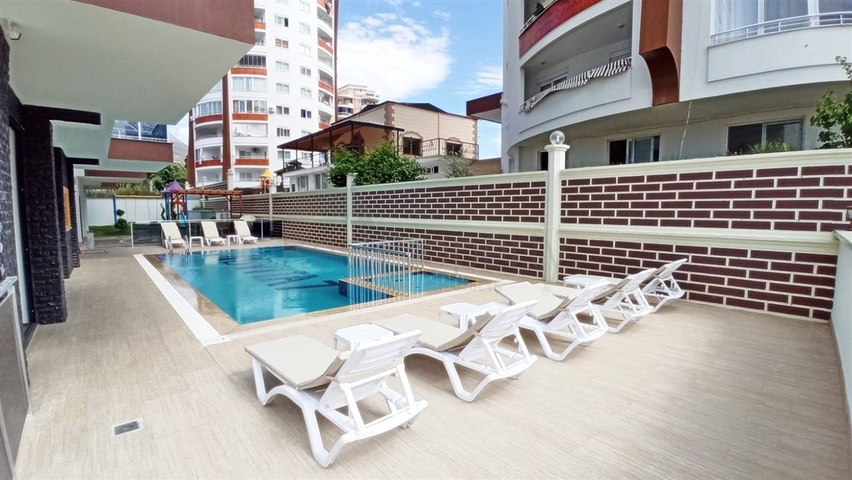 شقة غرفة وصالة ضمن مجمع جديد - في محمودلار / الانيا 