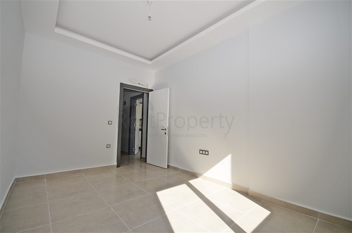 شقة غرفة وصالة ضمن مجمع جديد - في محمودلار / الانيا 