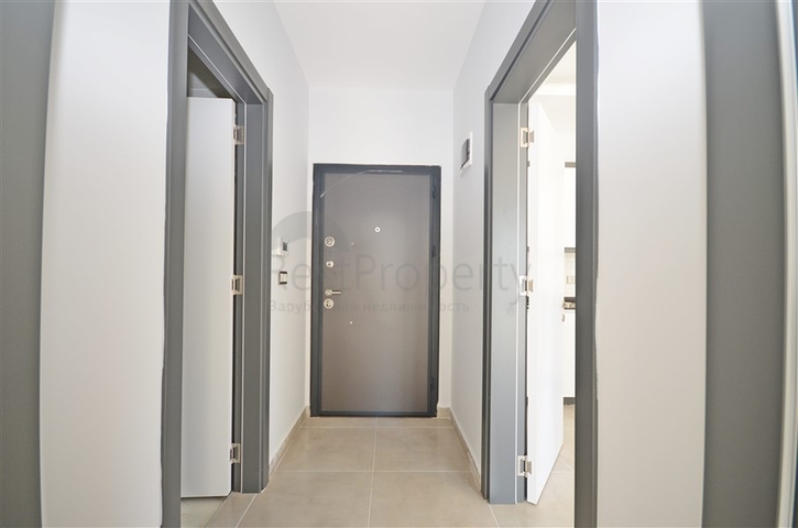 شقة غرفة وصالة ضمن مجمع جديد - في محمودلار / الانيا 