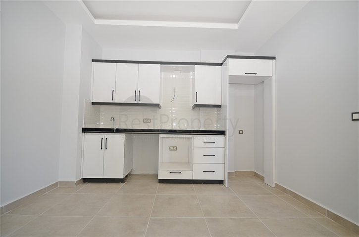 شقة غرفة وصالة ضمن مجمع جديد - في محمودلار / الانيا 