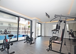 شقة غرفة وصالة ضمن مجمع جديد - في محمودلار / الانيا 