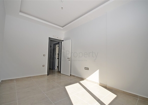 شقة غرفة وصالة ضمن مجمع جديد - في محمودلار / الانيا 