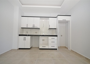 شقة غرفة وصالة ضمن مجمع جديد - في محمودلار / الانيا 