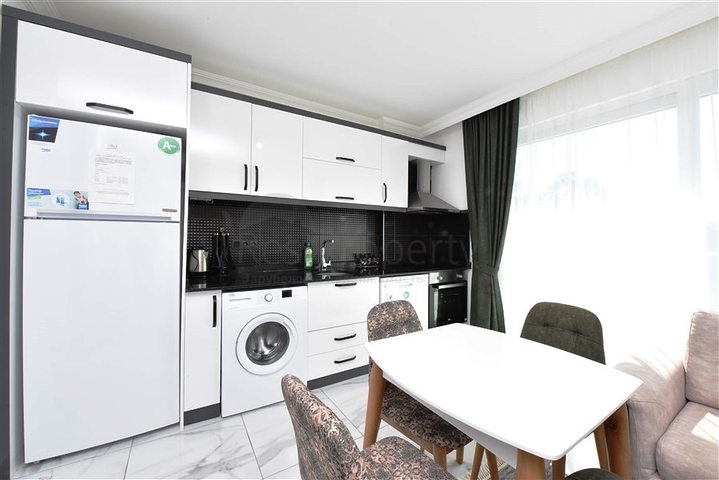 سعر اقتصادي - شقة مفروشة من تصميم غرفة نوم وصالة ضمن مجمع - في افسلار / الانيا 