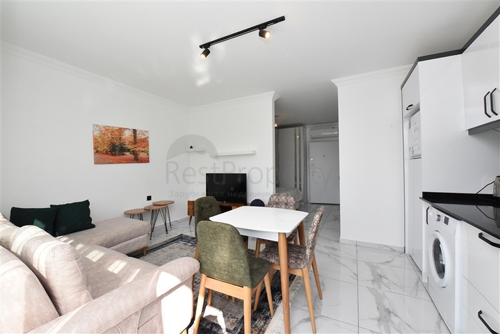 سعر اقتصادي - شقة مفروشة من تصميم غرفة نوم وصالة ضمن مجمع - في افسلار / الانيا 