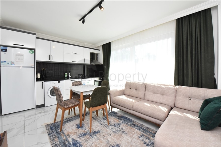 سعر اقتصادي - شقة مفروشة من تصميم غرفة نوم وصالة ضمن مجمع - في افسلار / الانيا 