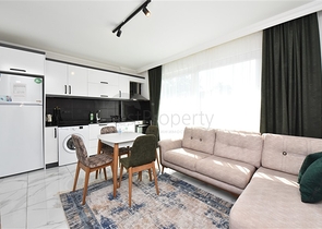 سعر اقتصادي - شقة مفروشة من تصميم غرفة نوم وصالة ضمن مجمع - في افسلار / الانيا 